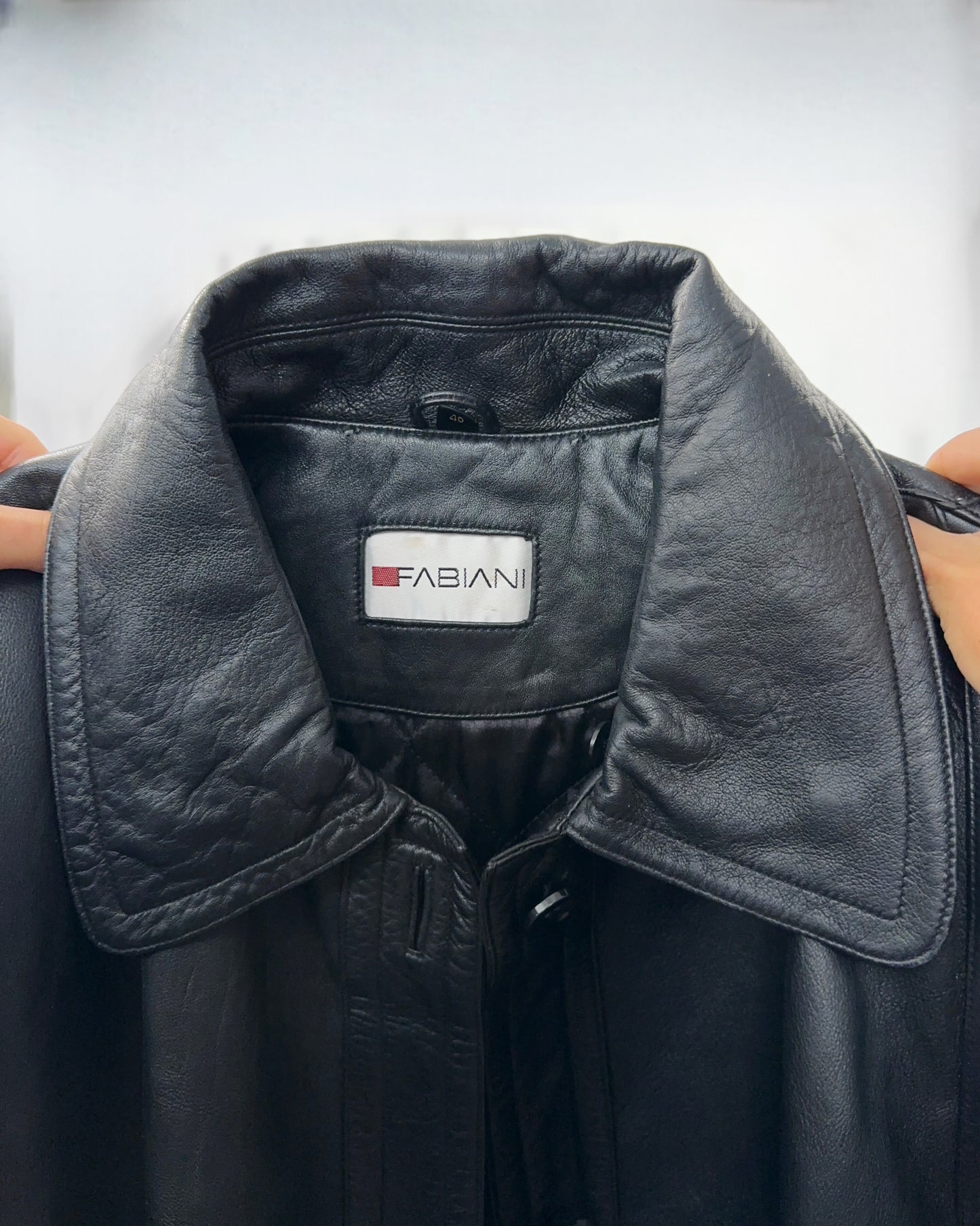 Trench in vera pelle geometrico