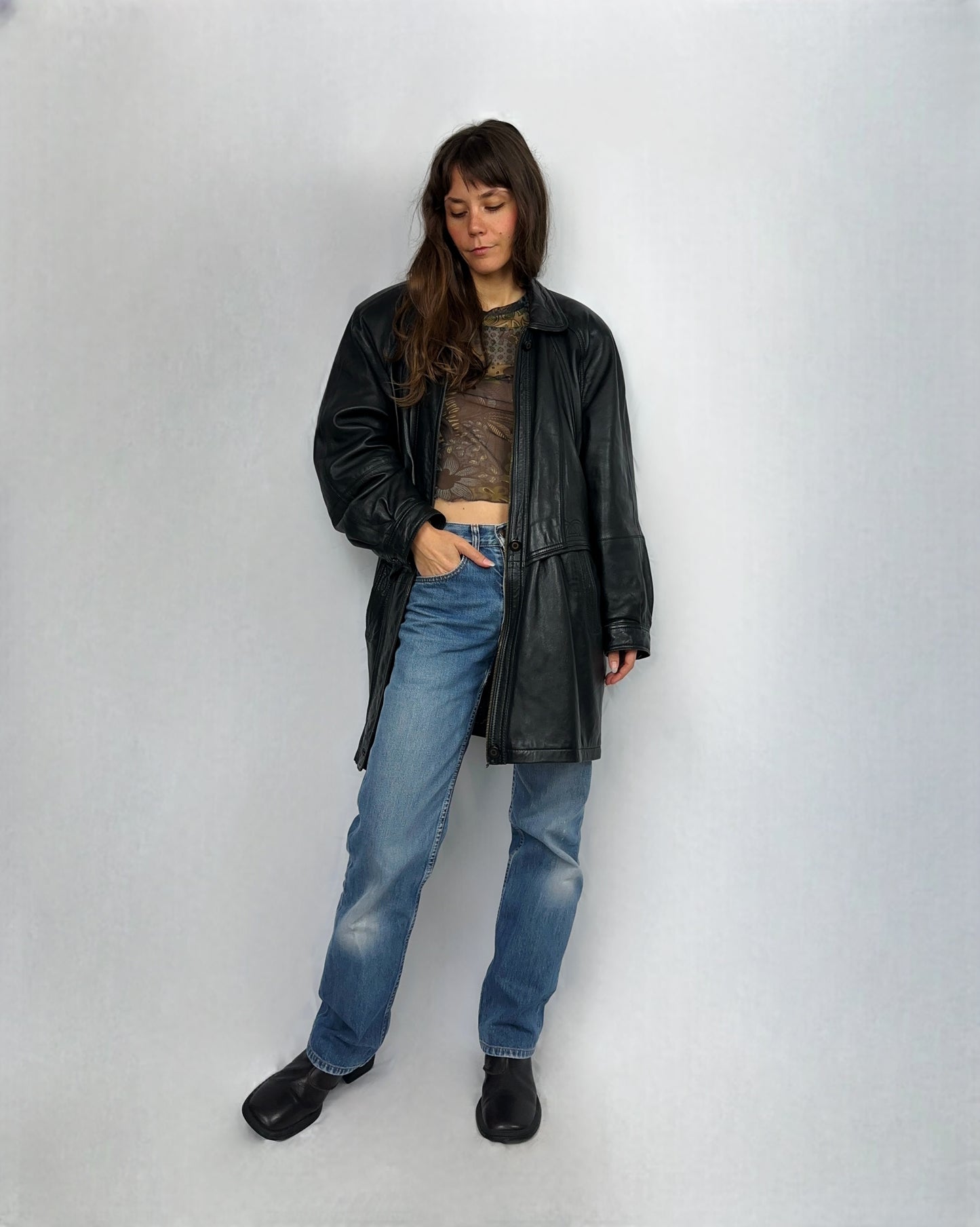 Trench in vera pelle con motivo intrecciato