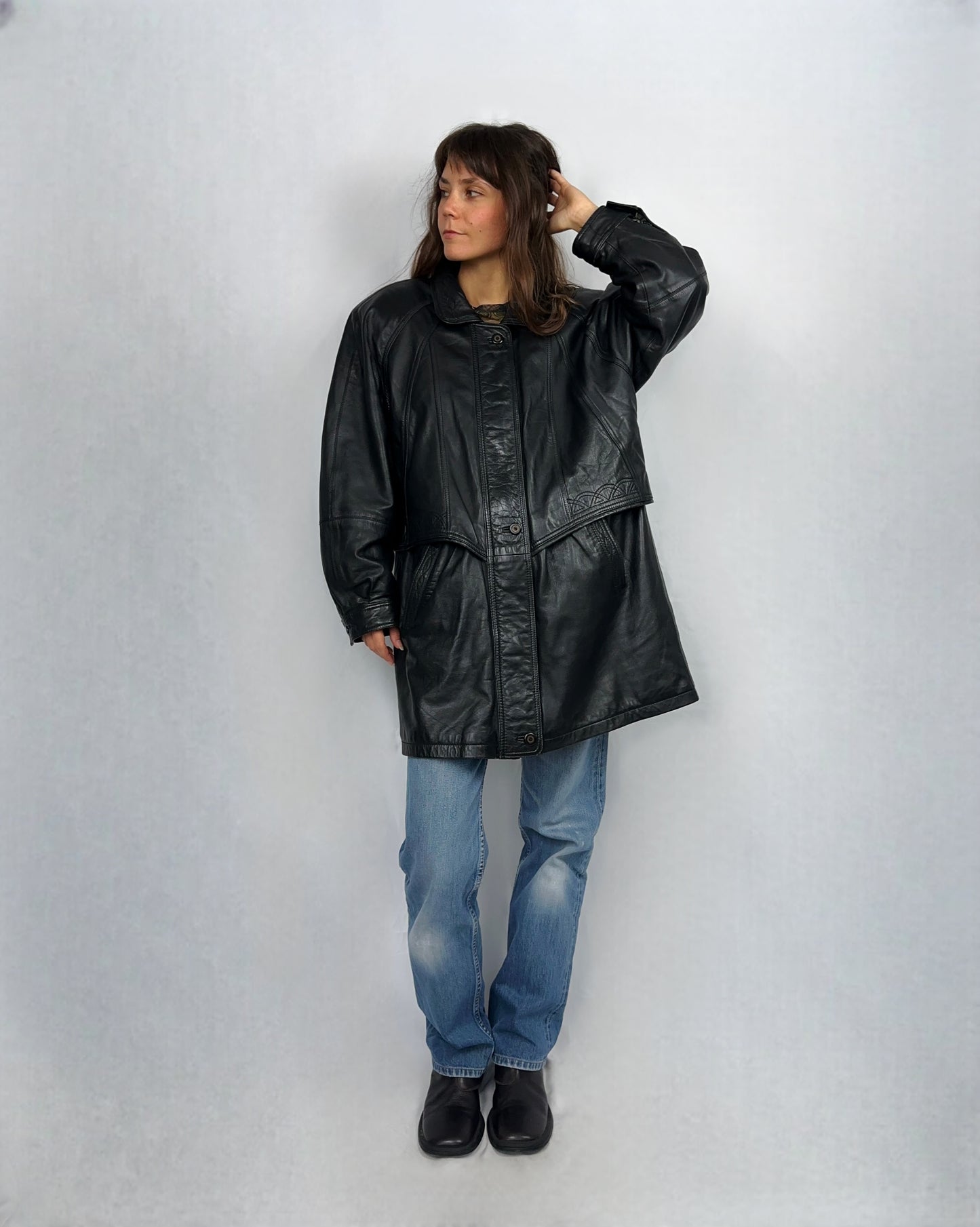 Trench in vera pelle con motivo intrecciato