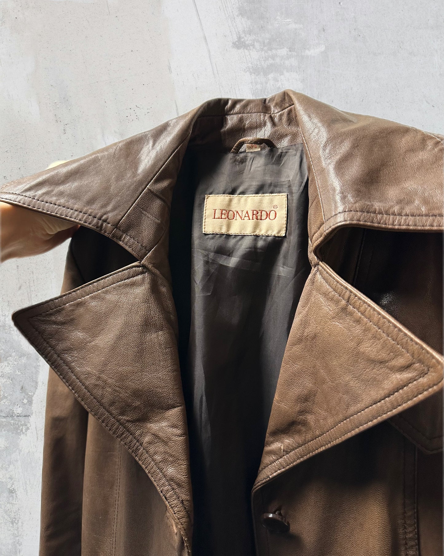 Trench in vera pelle fango